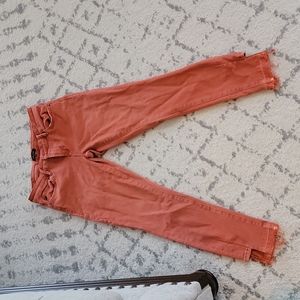 Orange skinny jeans